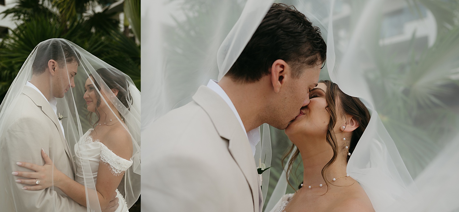 man kisses his bride under her veil by Thistle and Veil Photo