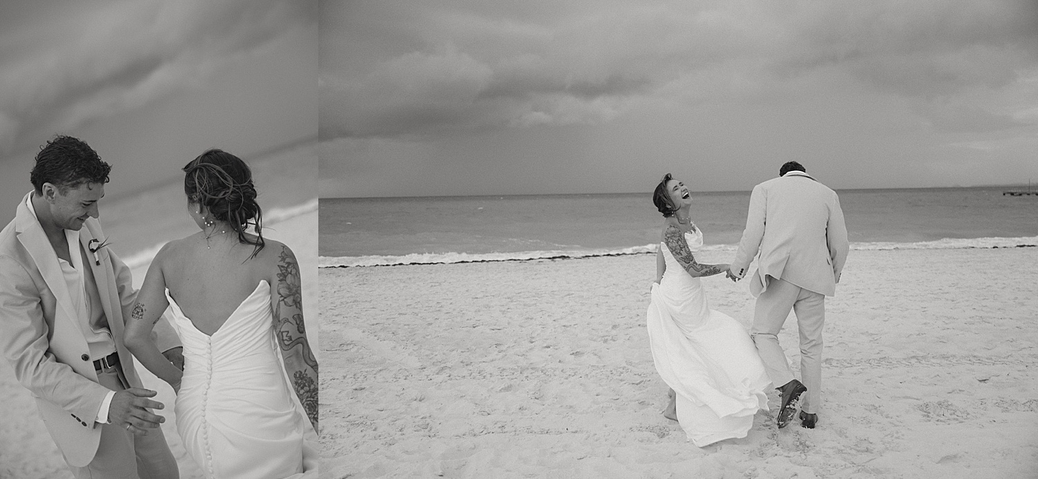 husband and wife walk hand in hand on the beach by Travel Elopement Photographer